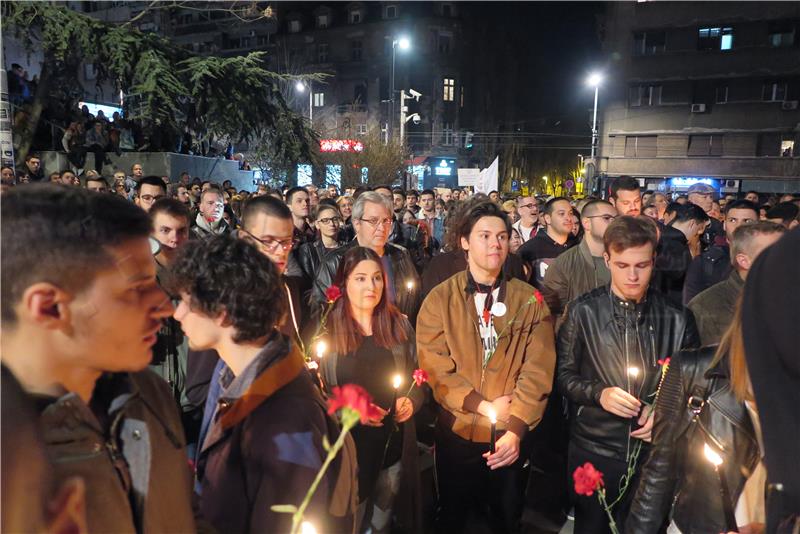 Anti-government protesters in Belgrade pay tribute to victims of 1999 NATO campaign