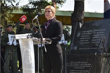 President addresses commemoration for 12 police officers killed by paramilitaries 28 years ago