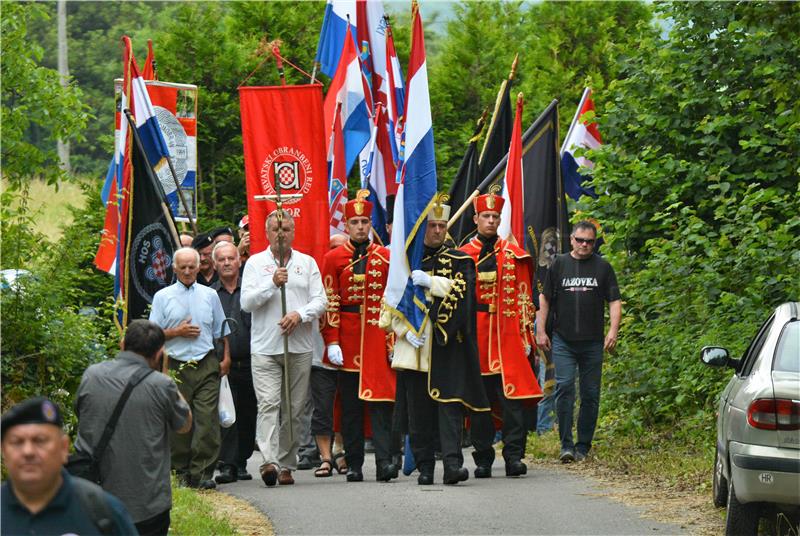 Presidential envoy booed at Jazovka commemoration