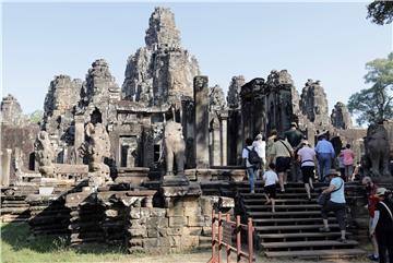 Tourists visit the Angkor Archaeological Park in Cambodia