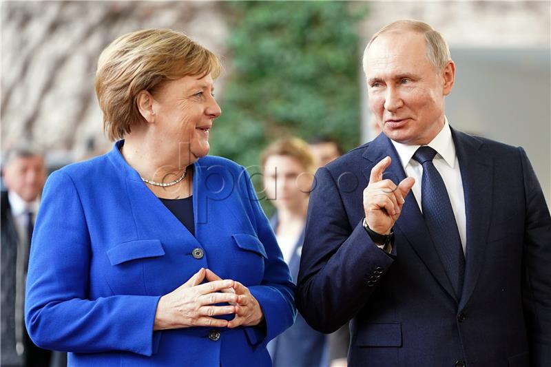 Putin, Merkel speak by phone to commemorate end of WWII in Europe