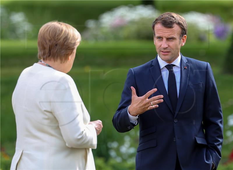 Merkel će posjetiti Macrona u drugoj polovici kolovoza