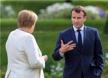 Merkel će posjetiti Macrona u drugoj polovici kolovoza