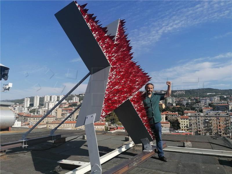 Artistic installation dedicated to red star put on Rijeka high-rise