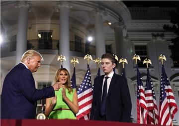 (FILE) USA PEOPLE BARRON TRUMP CORONAVIRUS