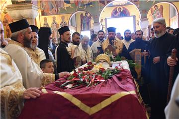 Thousands gather for funeral of pro-Serb religious dignitary in Montenegro