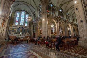 FRANCE PANDEMIC BELIEF  CATHOLIC MASS