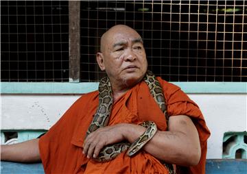 MYANMAR MONASTERY SNAKE SHELTER