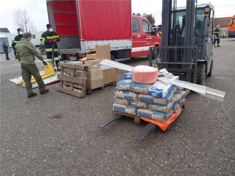 Slovenian and Austrian firefighters bring aid for earthquake victims