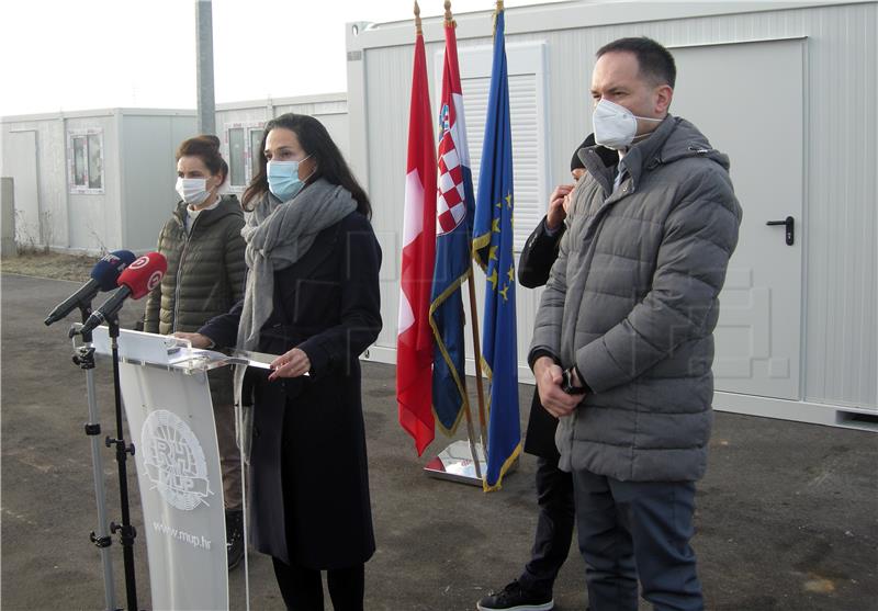 Swiss ambassador hands over 20 housing, 12 sanitary containers to quake-hit area