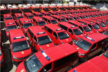 Firefighting units given 75 vans, 15 fire trucks