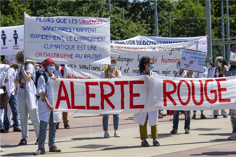 SWITZERLAND WHO DOCTORS CLIMATE CHANGE PROTEST