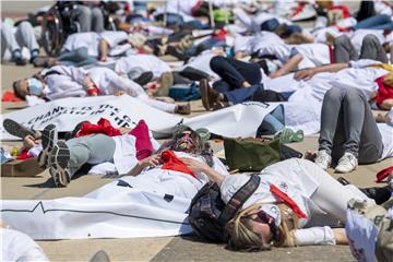 SWITZERLAND WHO DOCTORS CLIMATE CHANGE PROTEST