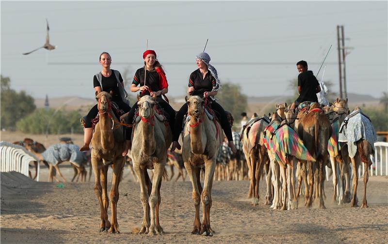 UAE FEMALE CAMEL RIDING SCHOOL