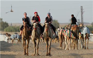 UAE FEMALE CAMEL RIDING SCHOOL