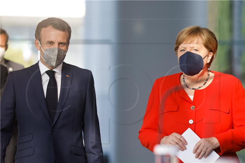 Merkel i Macron za koordiniran pristup članica EU u otvaranju granica