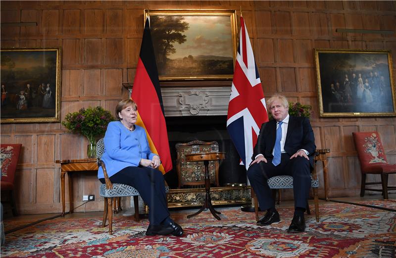 BRITAIN GERMANY POLITICS SECURITY POLICY DEAL