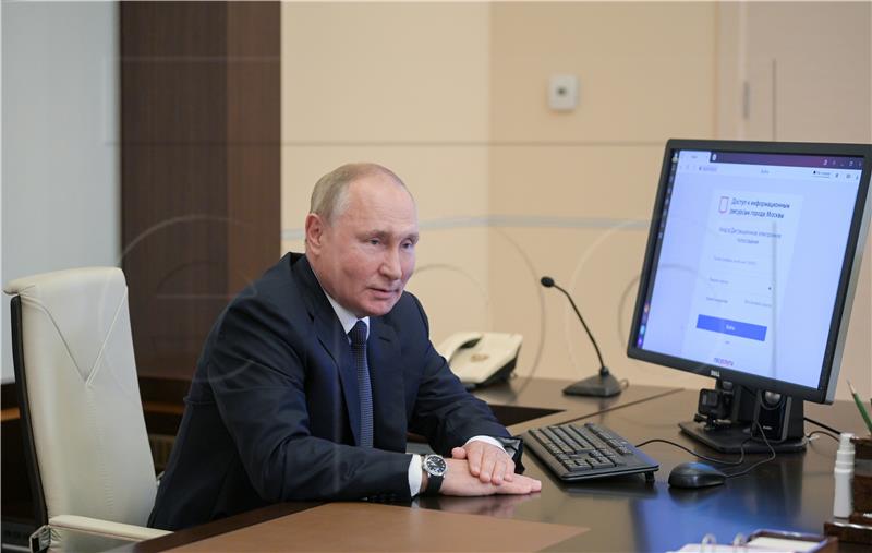 RUSSIA ELECTIONS PUTIN VOTING