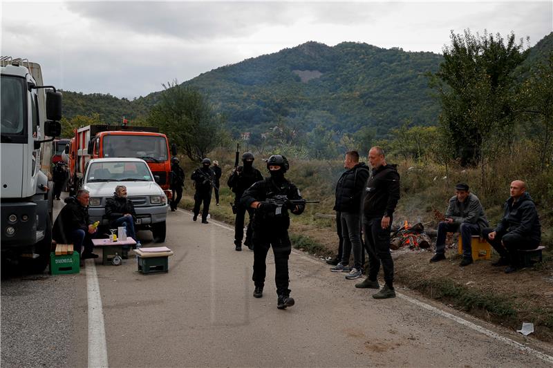 Police still in north of Kosovo, local Serbs blocking traffic