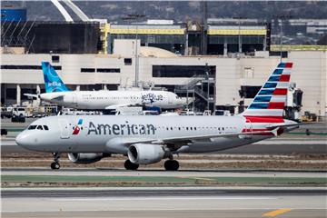 USA TRANSPORT AMERICAN AIRLINES JETBLUE DOJ