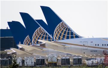 USA TRANSPORT UNITED AIRLINES HOLDINGS EARNINGS