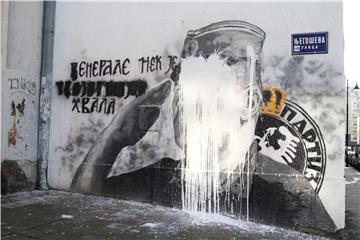 Mural of war criminal Ratko Mladić in Belgrade painted over after being egged