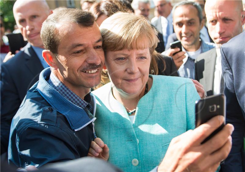 (FILE) GERMANY PHOTO SET ERA CHANCELLOR MERKEL