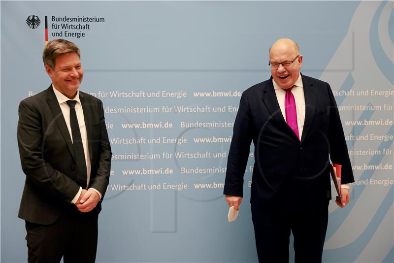 GERMANY GOVERNMENT ECONOMY POLITICS HANDOVER