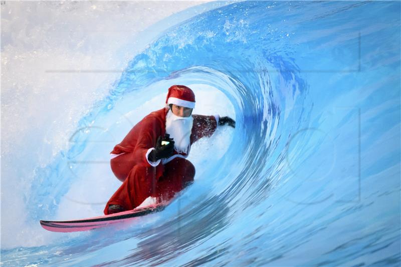 SWITZERLAND SURFING SANTA CLAUS