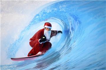 SWITZERLAND SURFING SANTA CLAUS