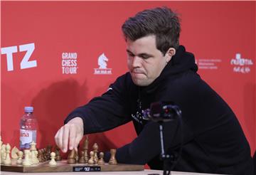 Turnir prvaka: Magnus Carlsen na čelu