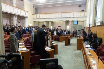 Parliament begins session with minute's silence for people killed in storm