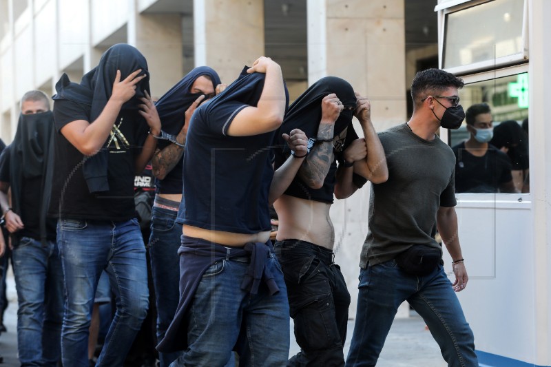 Greek prosecutorial authorities press charges against 104 persons