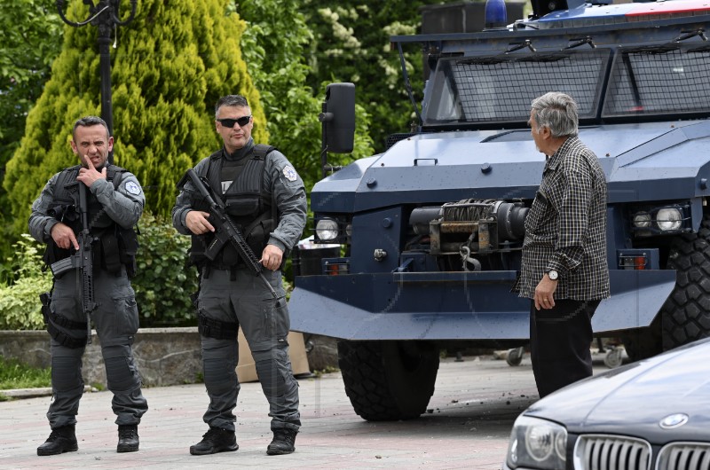 Dozens of gunmen surrounded by police in northern Kosovo