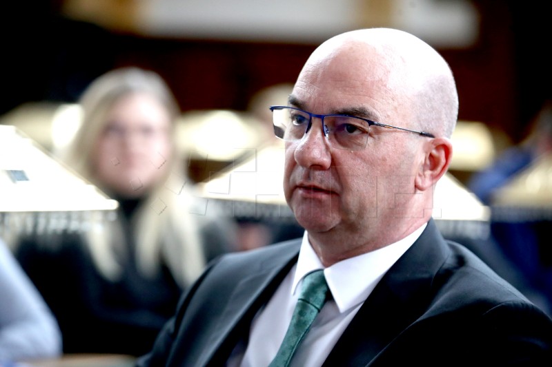 State secretary says attended party while off duty, permits not discussed