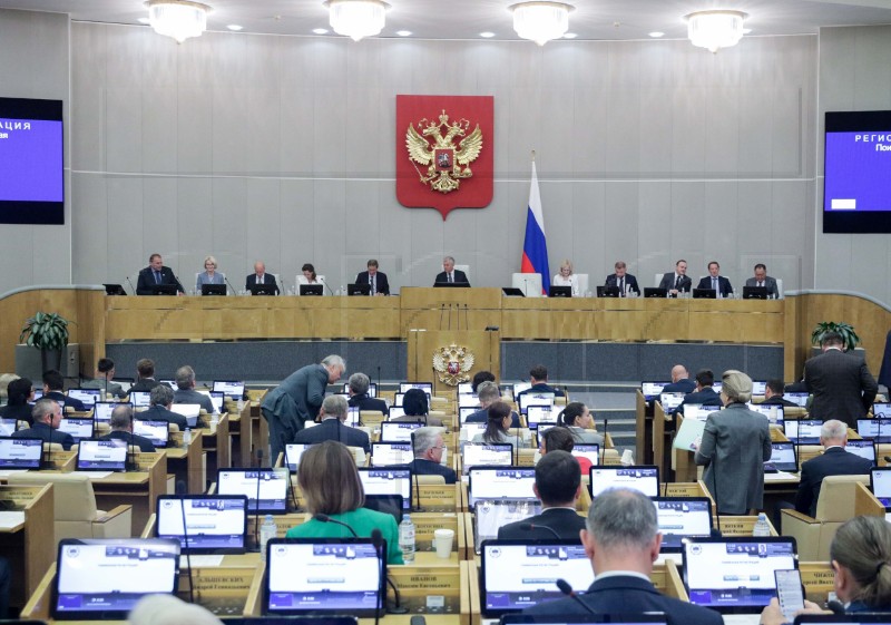 RUSSIA PARLIAMENT ADOPTION BILL