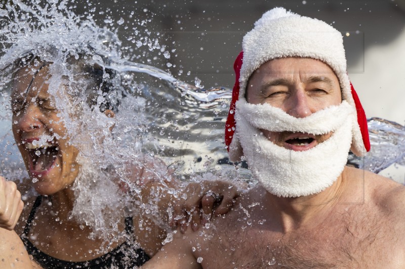 SWITZERLAND CHRISTMAS SWIMMING