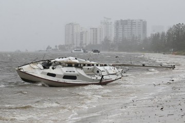 AUSTRALIA CYCLONE ALFRED WEAKENS INTO TROPICAL LOW