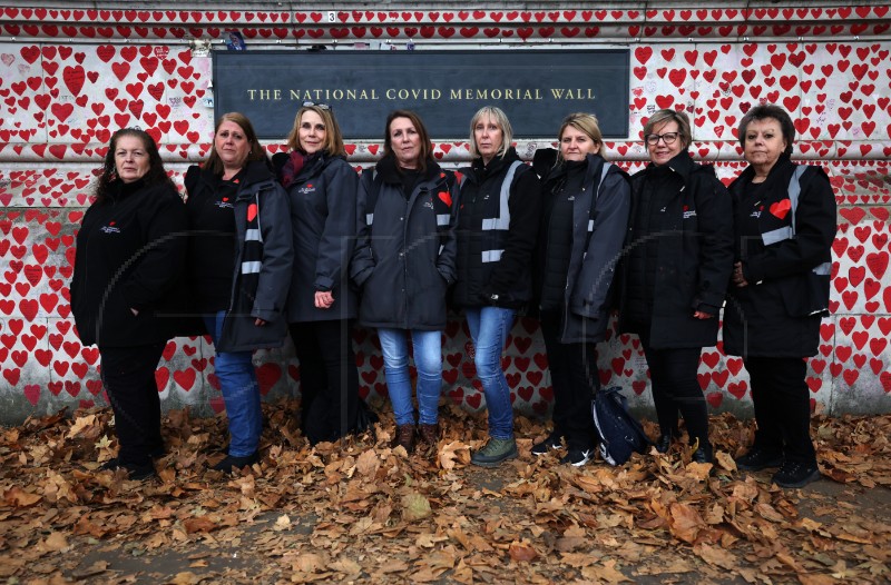 BRITAIN FOCUS ESSAY COVID WOMEN WALL