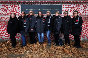 BRITAIN FOCUS ESSAY COVID WOMEN WALL