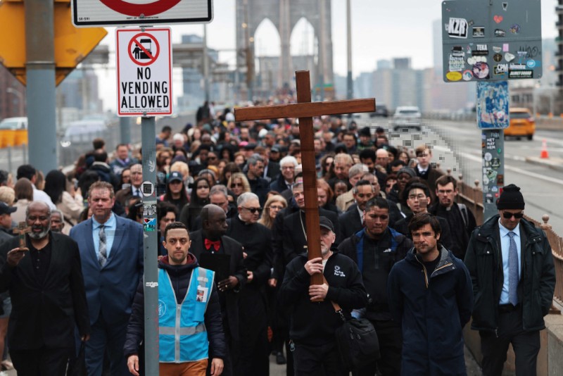 US-CATHOLICS-HOLD-WAY-OF-CROSS-PROCESSIONS-IN-NEW-YORK-ON-GOOD-F