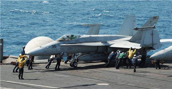 AT SEA USA IRAQ AIR STRIKES