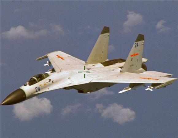 AT SEA USA CHINESE FIGHTER INTERCEPT