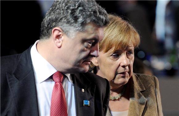 Porošenko najavio sastanak s Putinom, Hollandeom i Merkel u siječnju