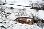 BiH: klizište u Kaknju srušilo tri kuće, poginula majka dvoje djece