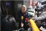 Kolinda Grabar Kitarović izlazi iz stana