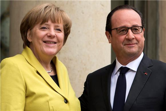 Merkel i Hollande kažu da Grčka treba ostati u eurozoni