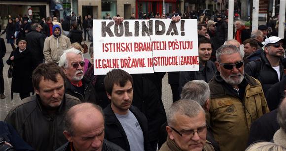 Occupy Croatia activists demonstrate against protesting war veterans