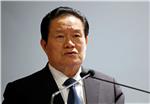 FILE INDIA CHINA ZHOU YONGKANG CHARGED