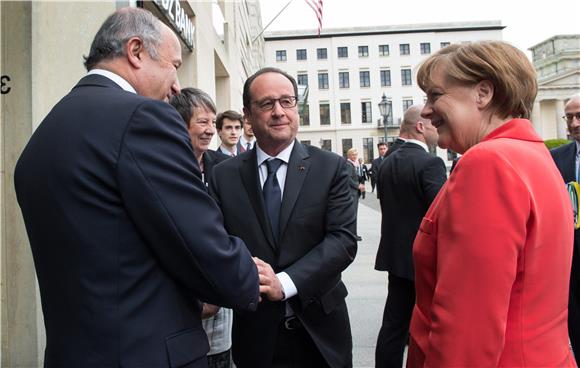 Hollande i Merkel pozivaju na sporazum o klimi